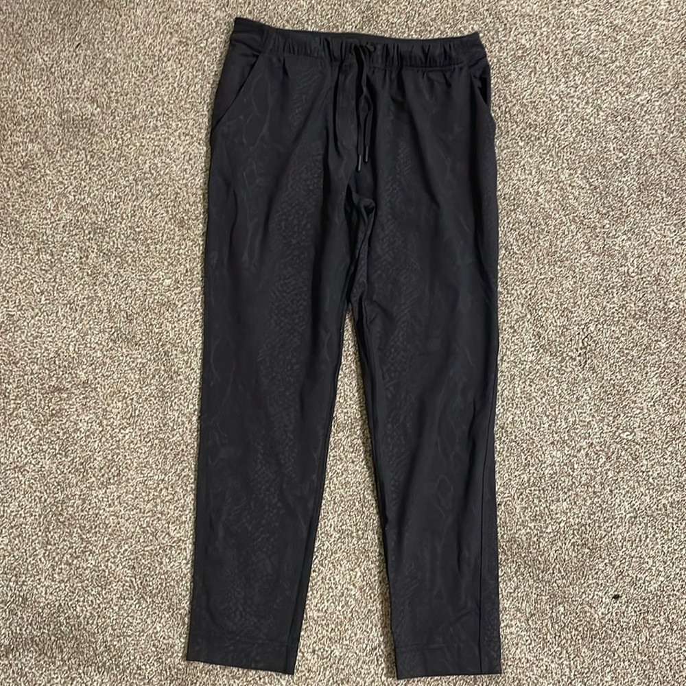 Women’s size 4 black snake print lululemon joggers